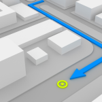 Uma cidade representada por retângulos cinzas. Uma linha azul que representa uma rota corta as ruas da cidade até chegar em um determinado local marcado por um círculo amarelo.
